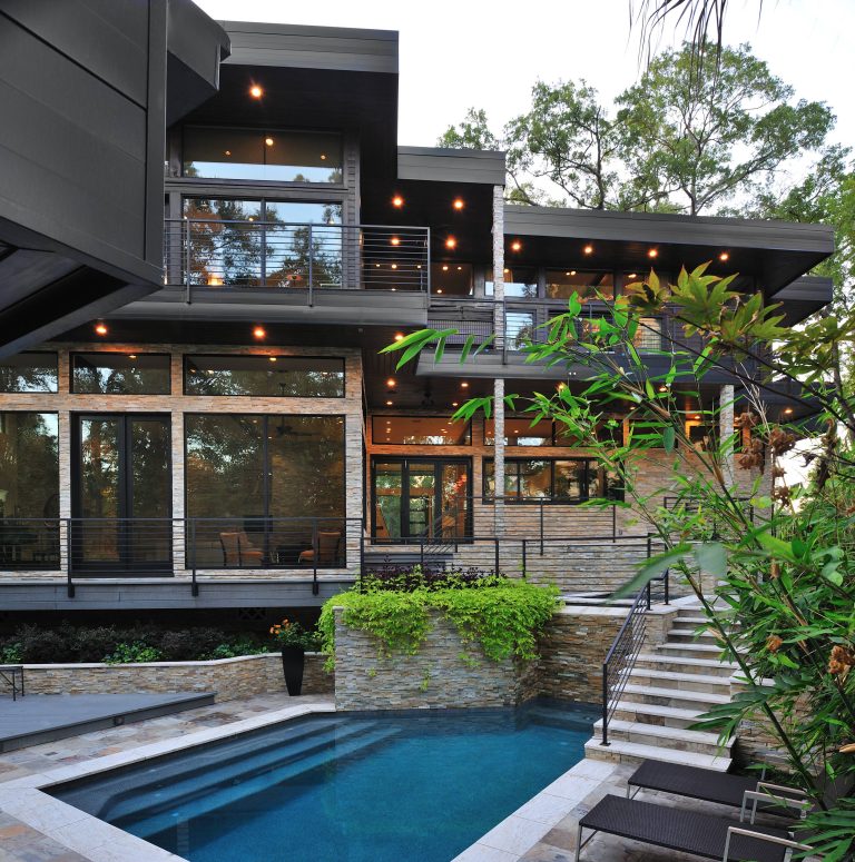 Pool - contemporary custom-shaped pool idea in Houston