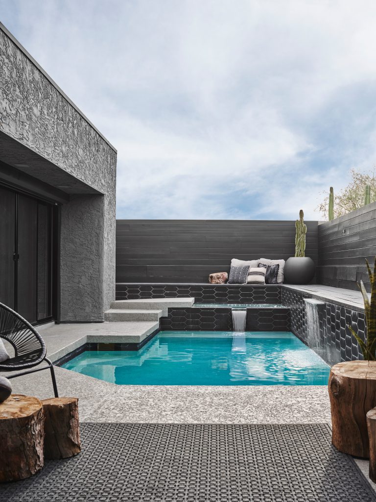 Pool fountain - contemporary custom-shaped pool fountain idea in Phoenix