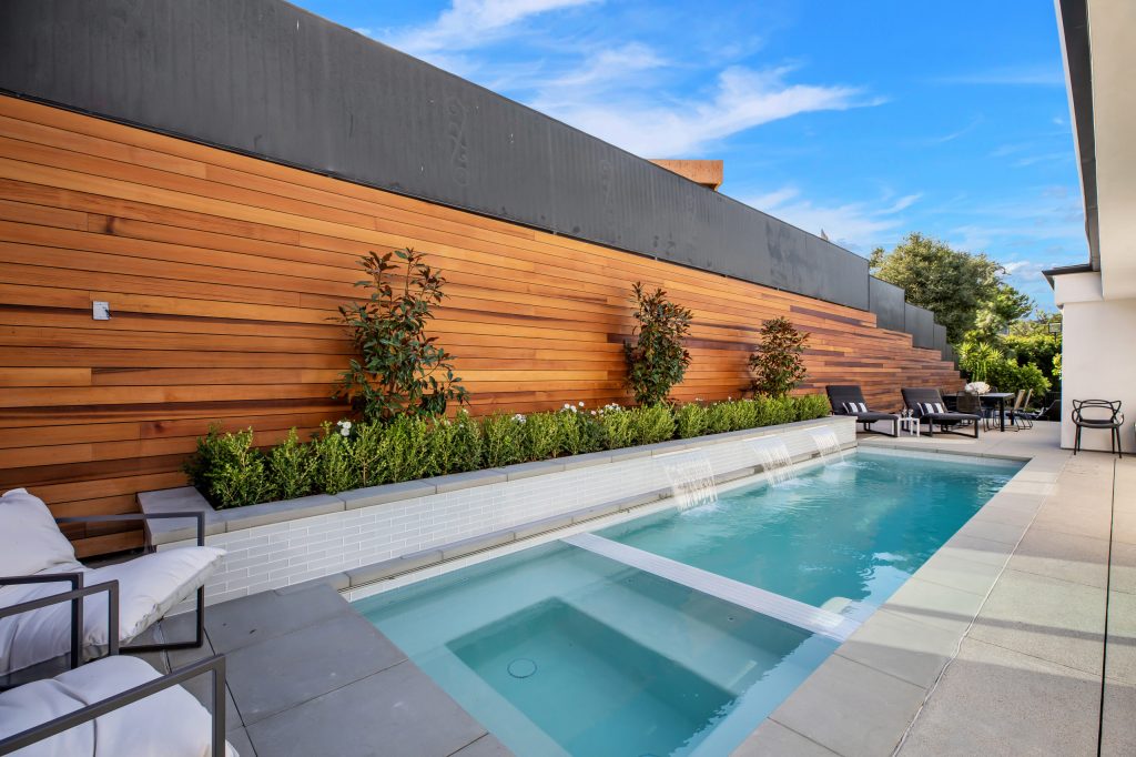 Pool fountain - contemporary rectangular pool fountain idea in Los Angeles