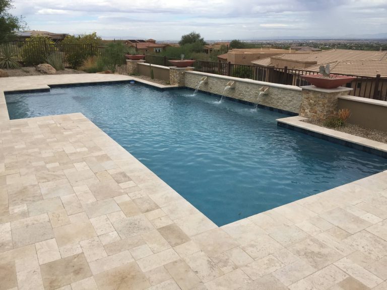 Pool fountain - mid-sized transitional backyard stone and rectangular lap pool fountain idea in Phoenix