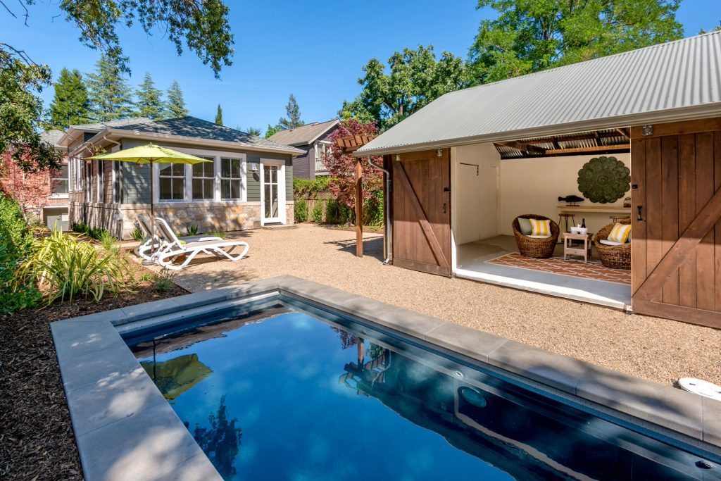 Pool house - country gravel and rectangular pool house idea in San Francisco