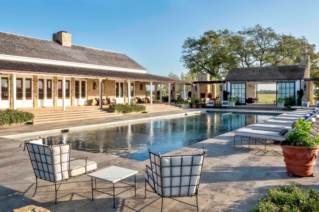 Pool house - farmhouse backyard rectangular pool house idea in Other