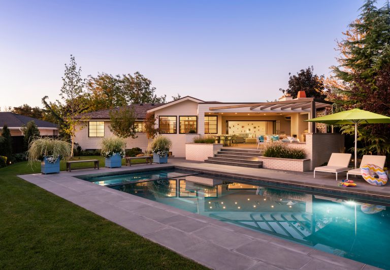 Pool - mid-sized transitional backyard tile and rectangular pool idea in Salt Lake City