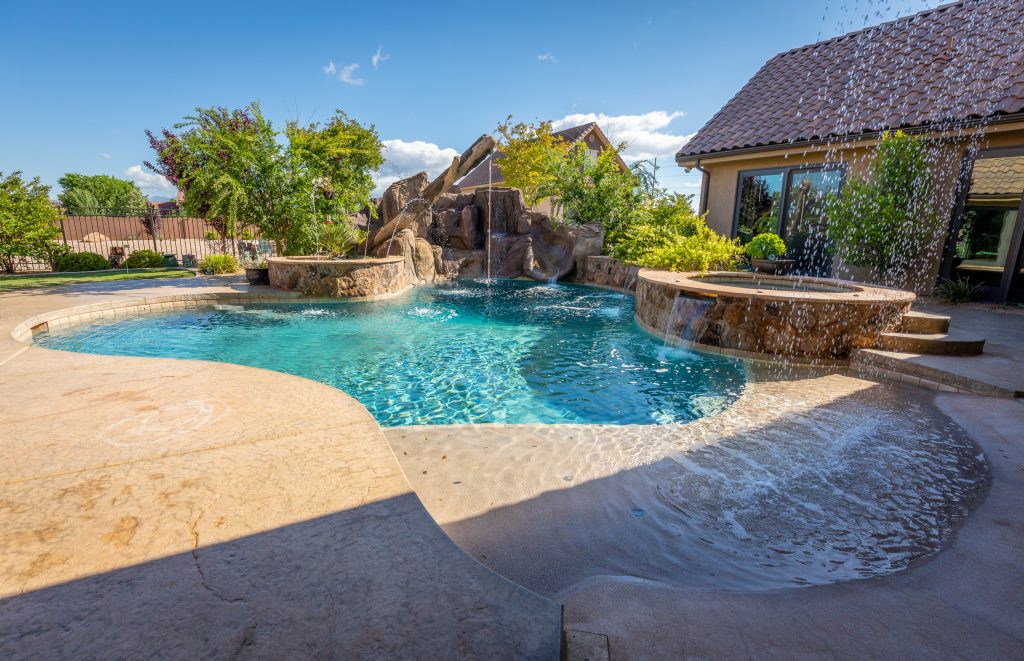 Pool - rustic custom-shaped pool idea in Other