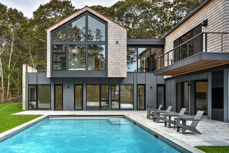 Pool - rustic rectangular pool idea in New York