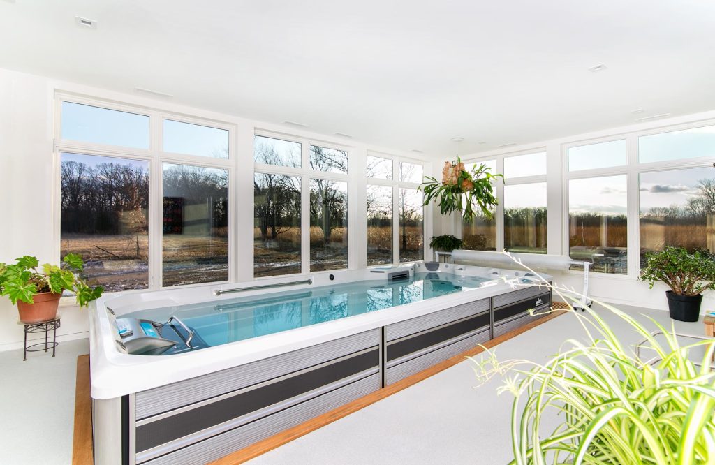 Pool - small modern indoor rectangular lap pool idea in Detroit
