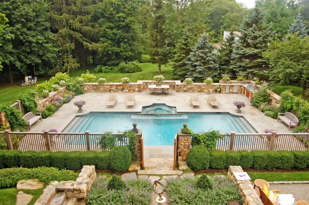 Pool - traditional backyard rectangular lap pool idea in New York