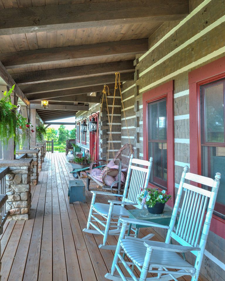 Porch of Log Cabin Home by Hochstetler Log Homes