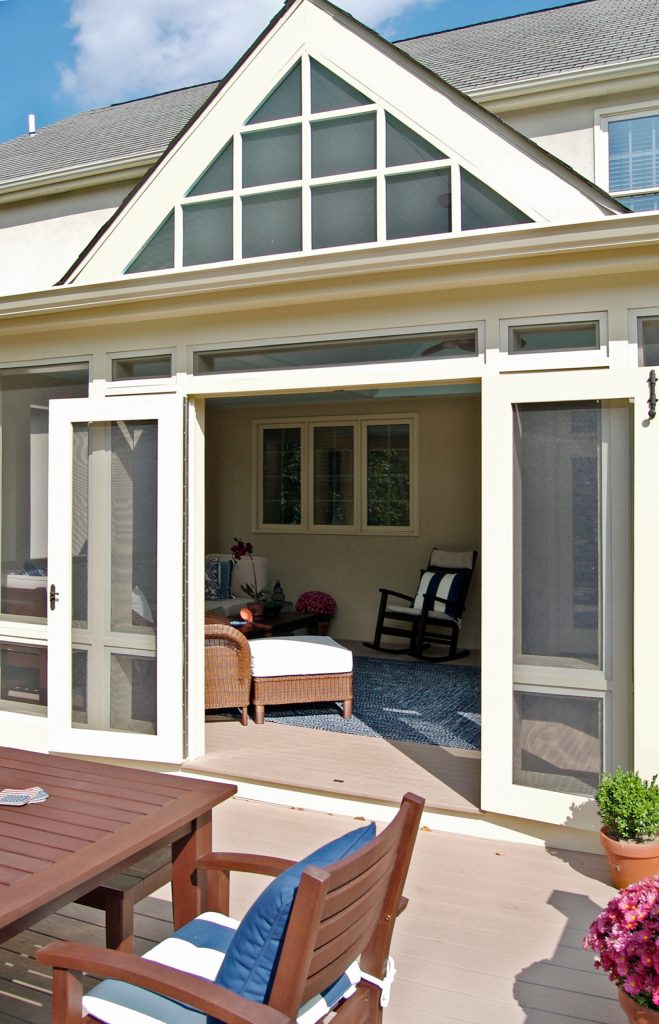 Project Details - Stone Terrace, walkway and Garden wall, Azek decking and Railling, Beadboard ceiling and landscaping