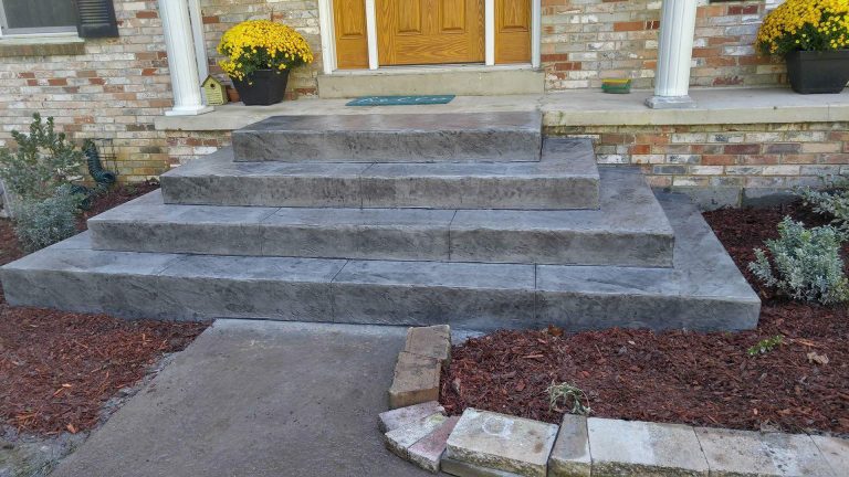 Pyramid style concrete steps.