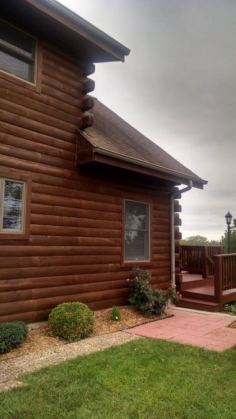 Re-stain log cabin in country, re-stained the deck and front porch