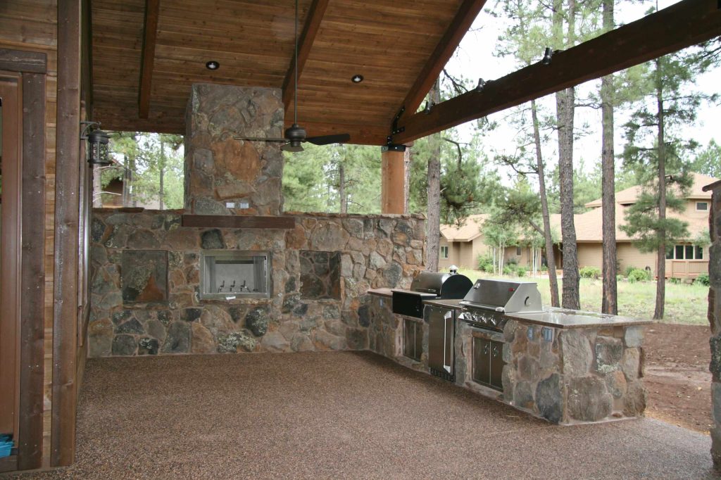 Rear patio with fireplace and outdoor kitchen (BBQ and smoker).