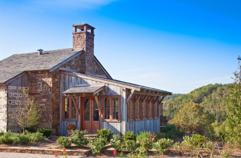 Reclaimed silver barn wood siding and hand hewn beams make up this great looking home.