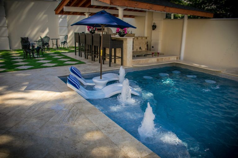 Rectangle Inground Pool with Freeform Sundeck, bubblers, swim-up bar and bar stools