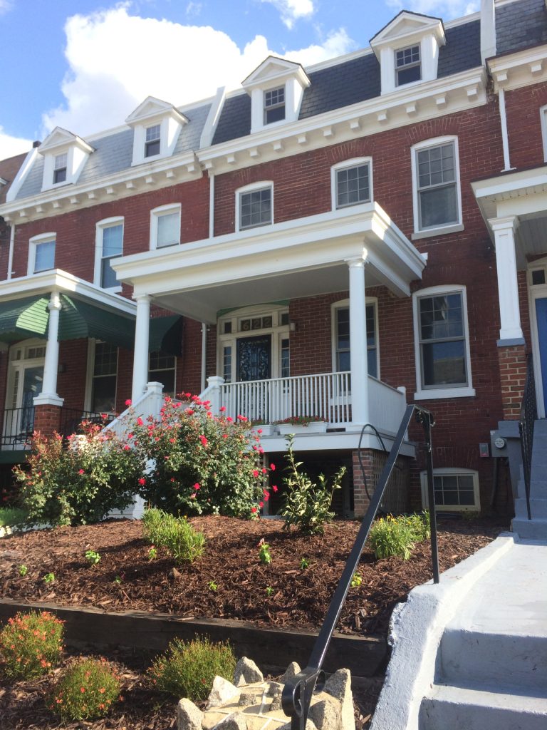 Renovated front exterior, rebuilt front porch (matching the details of the original), and front mansard. The mansard dormers were restored. The shelf gutter was rebuilt to match the original. by DANKE | Outdoor Photos | Porch | Landscaping | Landscape Design | Outdoor Living Space | Porch Design Ideas | Outdoor Living Space Ideas | Backyard Design