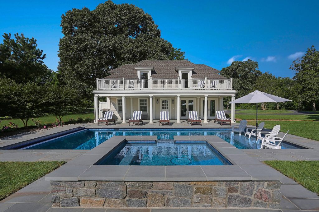 Renovated garage turned pool house and pool. © REAL-ARCH-MEDIA