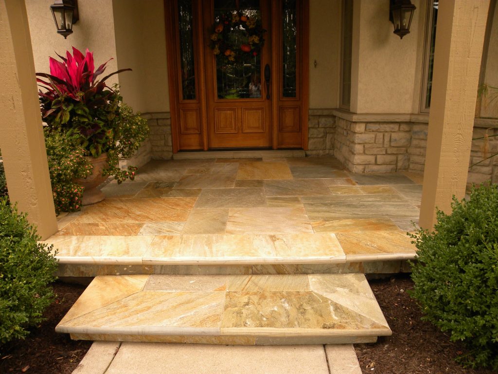 Residential Landscape Containers. Welcome home! Notice the bullnose detail on the porch stone. The container really pops with organic textures against the Travertine stone. by Smalls Landscaping | Outdoor Photos | Porch | Landscaping | Landscape Design | Outdoor Living Space | Porch Design Ideas | Outdoor Living Space Ideas | Backyard Design