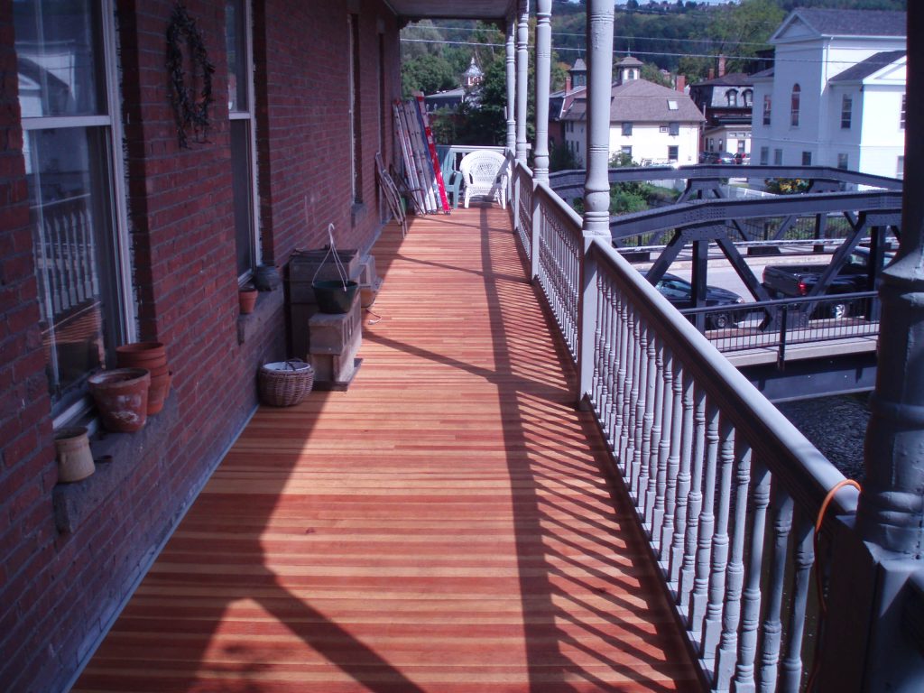 Restoration of a 120 year old 6 x 75 ft Porch. Restored to match existing. All 4 inch Clear Douglas Fur, no knots, With Grade (A) Cedar Rails and Spindles Shaper profiled to match existing, 120 years ago. by Scott Howard | Outdoor Photos | Porch | Landscaping | Landscape Design | Outdoor Living Space | Porch Design Ideas | Outdoor Living Space Ideas | Backyard Design