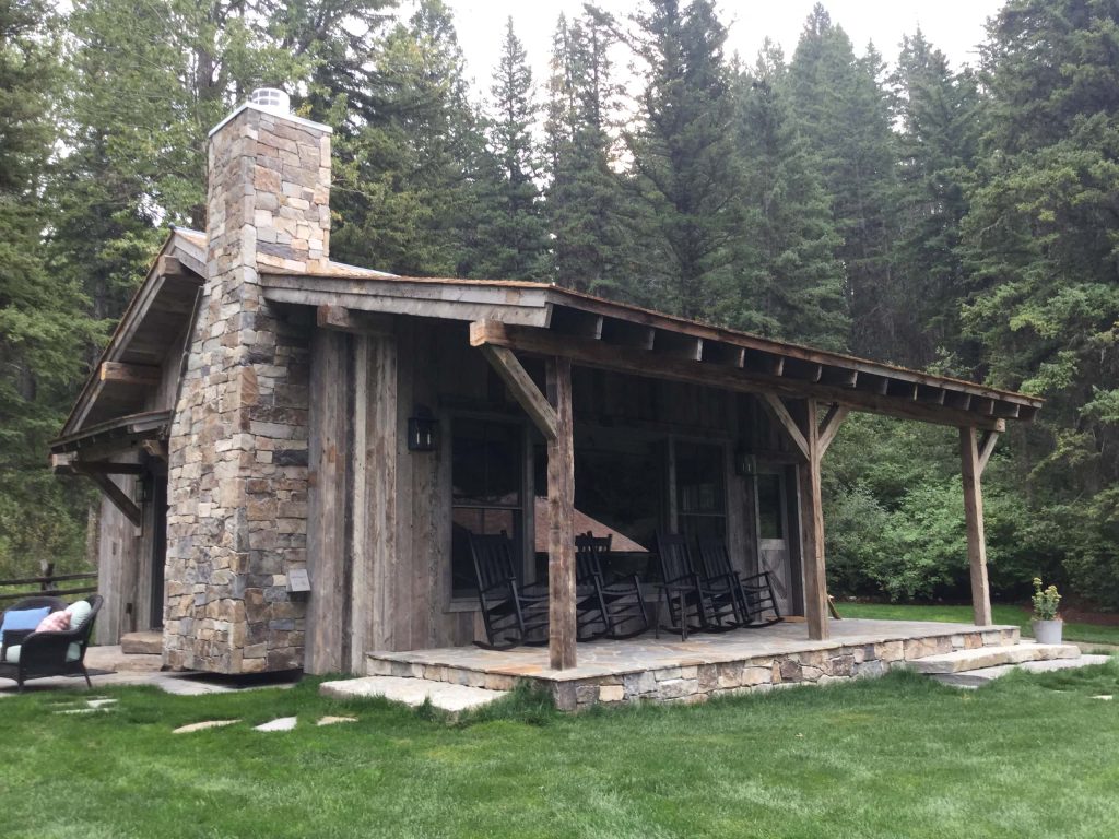 Rustic Wood Hub's reclaimed hand hewn timbers make for this great rustic porch setting.