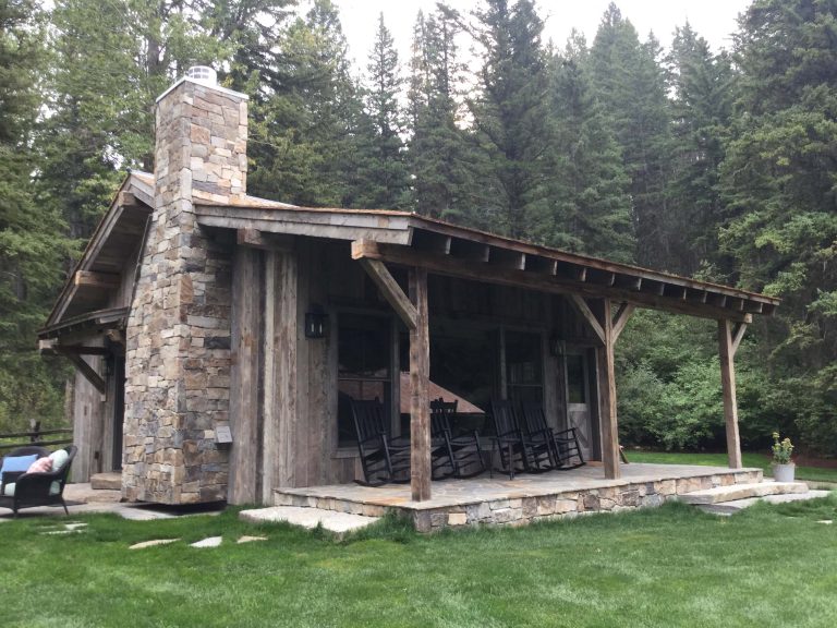Rustic Wood Hub's reclaimed hand hewn timbers make for this great rustic porch setting.