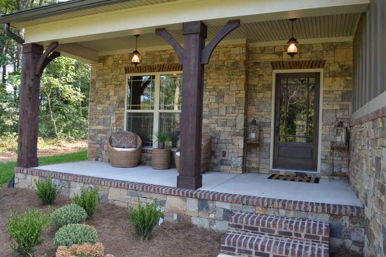 Rustic home I helped design with Pratt Homebuilders. I chose natural stone and cedar columns to add to the rustic exterior.