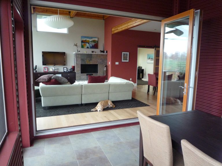 Screen Porch looking through La Cantina Folding Doors to Living Room