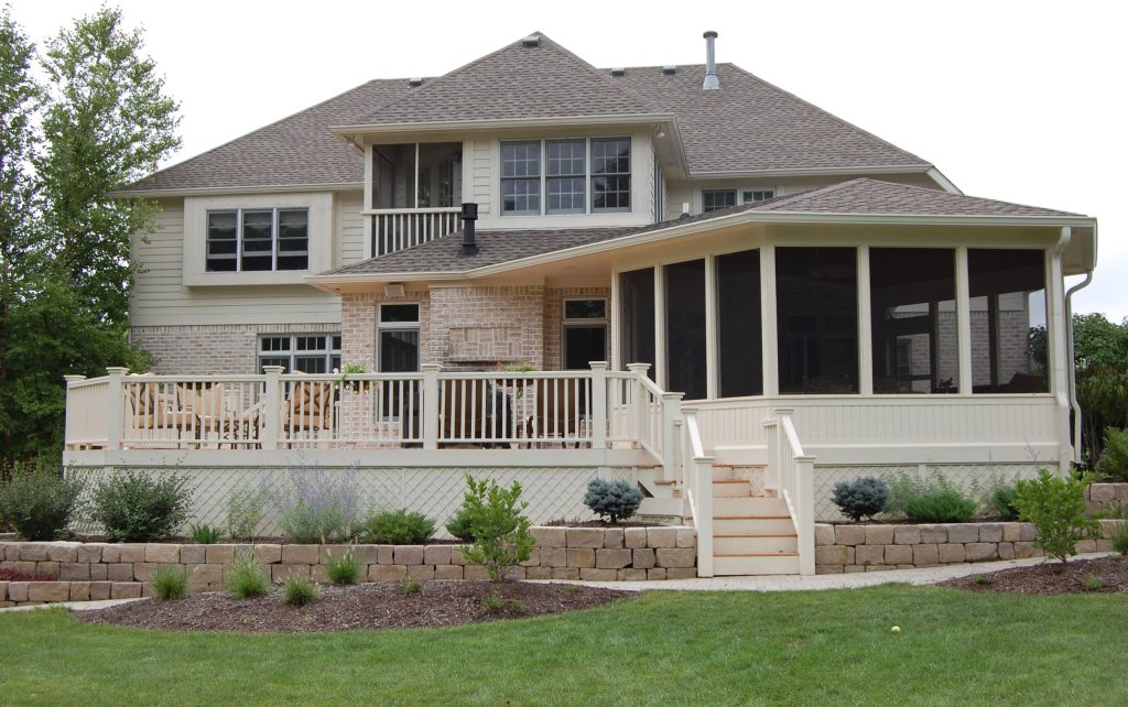 Screen porch and deck addition to a Carmel Indiana home and completed along with a kitchen expansion and remodel.