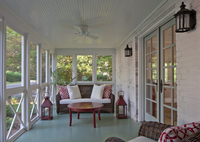 Screen porch was rebuilt with new wood pilasters, rails, trim, ceiling fan, lighting, and new French doors connecting it to dining room. Photo by Allen Russ by Wilets Architecture | Outdoor Photos | Porch | Landscaping | Landscape Design | Outdoor Living Space | Porch Design Ideas | Outdoor Living Space Ideas | Backyard Design