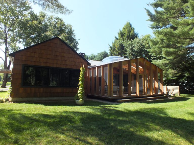 Screen porch with 9'x9' "bubble" skylights and structural fir beams