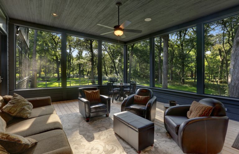 Screen porch with cedar flooring and lots of seating