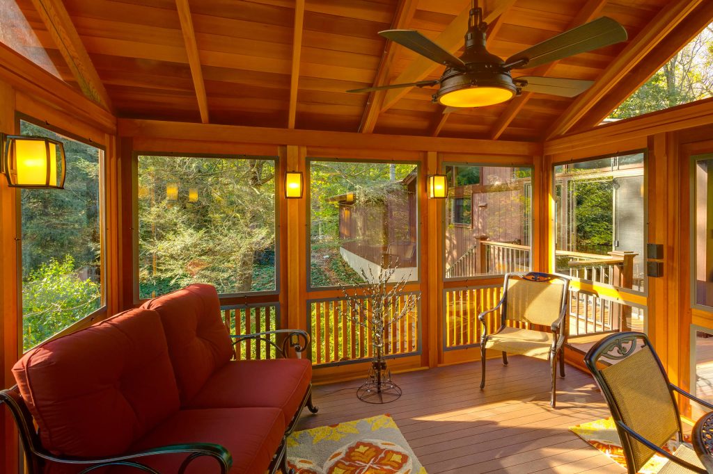 Screened-in back porch photo in Wilmington with decking by DiSabatino Landscaping and Tree Care | Outdoor Photos | Porch | Landscaping | Landscape Design | Outdoor Living Space | Porch Design Ideas | Outdoor Living Space Ideas | Backyard Design