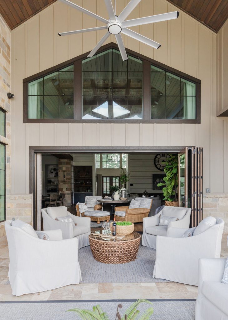 Screened in back porch with access through gorgeous Marvin accordian door unit.