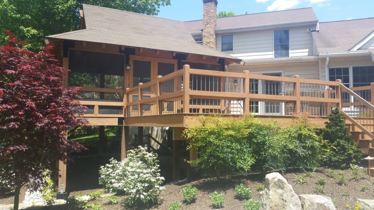 Screened in back porch with attached deck