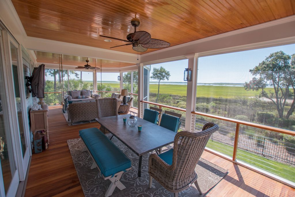 Select cypress beadboard ceilings -Garapa decking, handrails, and accents -Cable railing system
