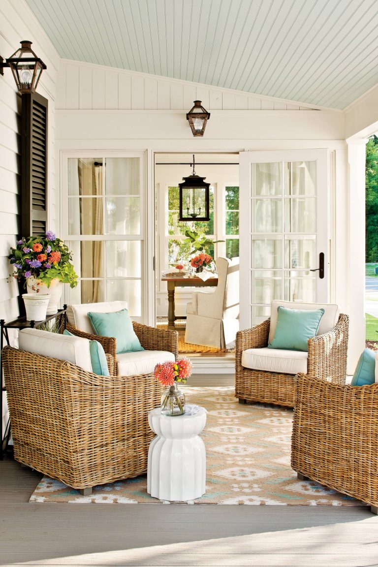 Side porch at the 2012 Southern Living Idea House in Senoia, Georgia, with a traditional "haint blue" ceiling. Photo: Laurey W. Glenn (courtesy Southern Living)