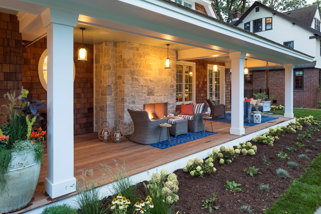 Simple but elegant landscaping sets the stage for this breathtaking front porch. Built by Great Neighborhood Homes, Photography by Troy Thies, Landscaping by Moms Landscaping by Laura Engen Interior Design | Outdoor Photos | Porch | Landscaping | Landscape Design | Outdoor Living Space | Porch Design Ideas | Outdoor Living Space Ideas | Backyard Design