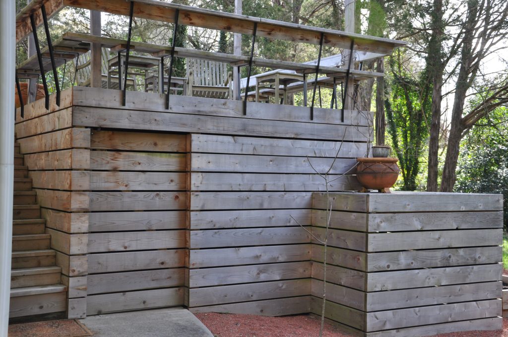 Sliding door integrated into deck design. John Koury