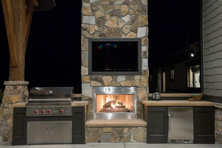 Small arts and crafts backyard concrete patio kitchen photo in Salt Lake City