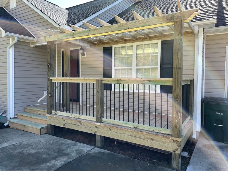Small arts and crafts metal railing front porch idea in Atlanta with a pergola by Cole Pelfrey Construction | Outdoor Photos | Porch | Landscaping | Landscape Design | Outdoor Living Space | Porch Design Ideas | Outdoor Living Space Ideas | Backyard Design