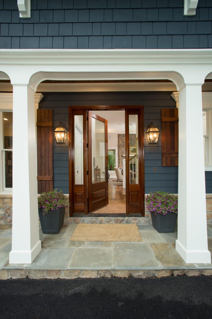Small arts and crafts stone front porch photo in DC Metro with a roof extension by James McDonald Associate Architects, PC | Outdoor Photos | Porch | Landscaping | Landscape Design | Outdoor Living Space | Porch Design Ideas | Outdoor Living Space Ideas | Backyard Design