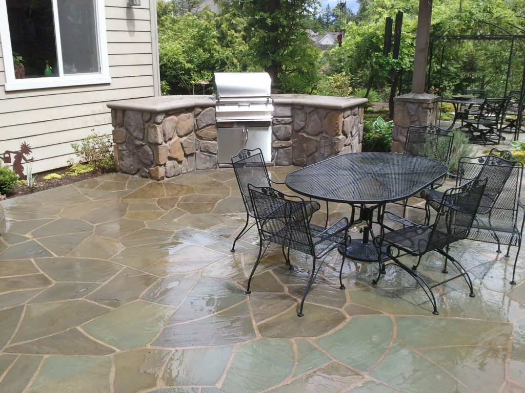 Small backyard patio kitchen photo in Seattle with no cover