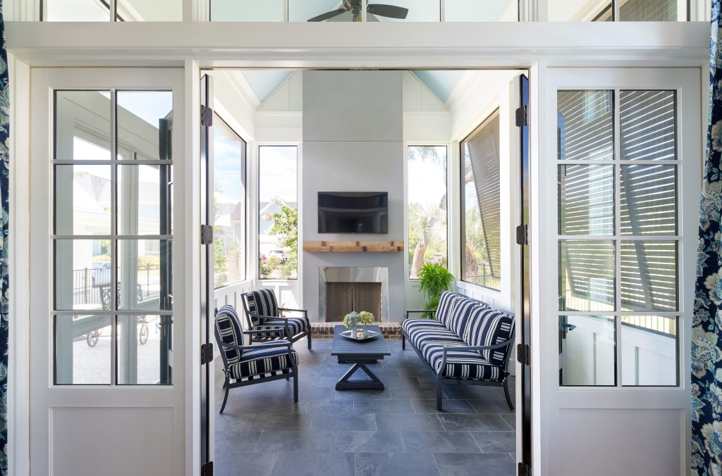 Small beach style screened-in side porch idea in Charleston with decking and a roof extension by SHELTER Custom-Built Living | Outdoor Photos | Porch | Landscaping | Landscape Design | Outdoor Living Space | Porch Design Ideas | Outdoor Living Space Ideas | Backyard Design