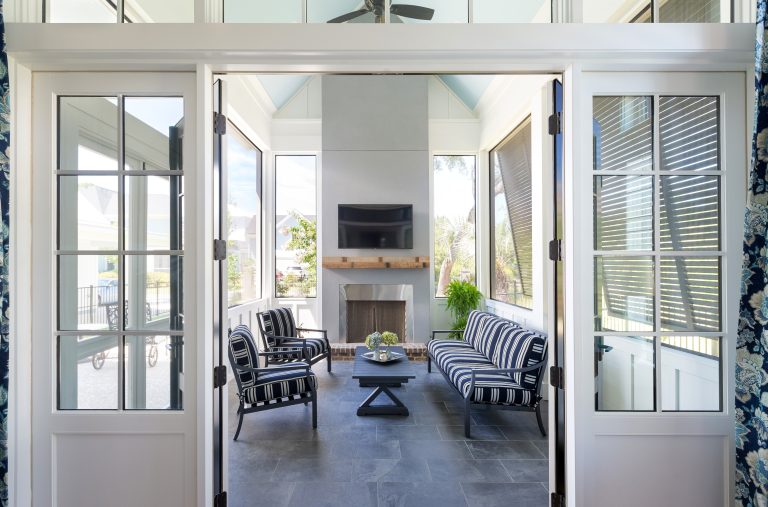 Small beach style screened-in side porch idea in Charleston with decking and a roof extension by SHELTER Custom-Built Living | Outdoor Photos | Porch | Landscaping | Landscape Design | Outdoor Living Space | Porch Design Ideas | Outdoor Living Space Ideas | Backyard Design