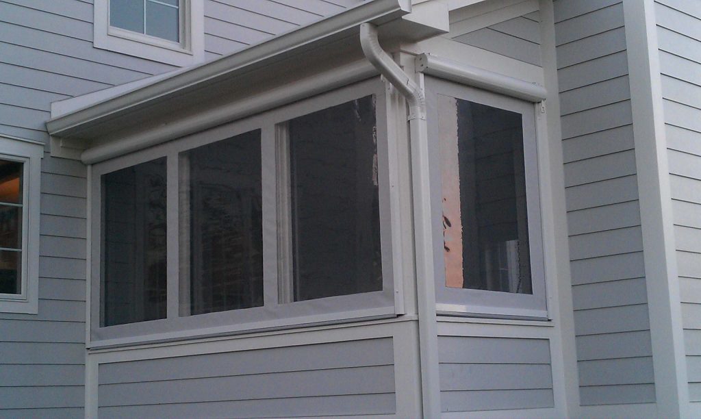 Small classic porch idea in Indianapolis with a roof extension by Shade By Design | Outdoor Photos | Porch | Landscaping | Landscape Design | Outdoor Living Space | Porch Design Ideas | Outdoor Living Space Ideas | Backyard Design