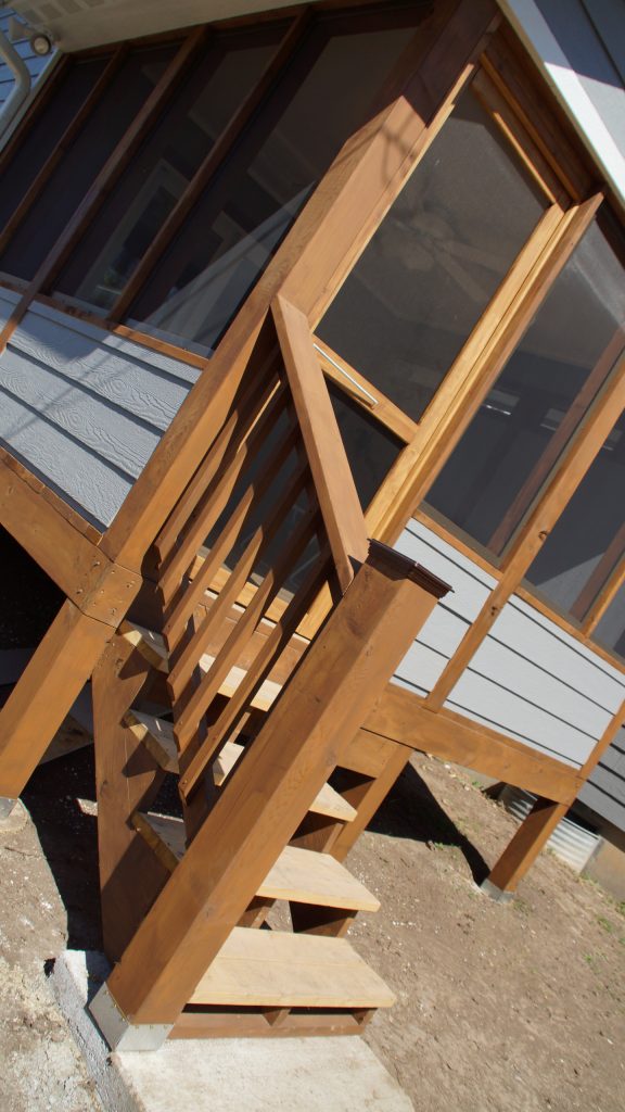 Small classic screened-in back porch idea in Other with decking and a roof extension by Winston Brown Remodeling | Outdoor Photos | Porch | Landscaping | Landscape Design | Outdoor Living Space | Porch Design Ideas | Outdoor Living Space Ideas | Backyard Design