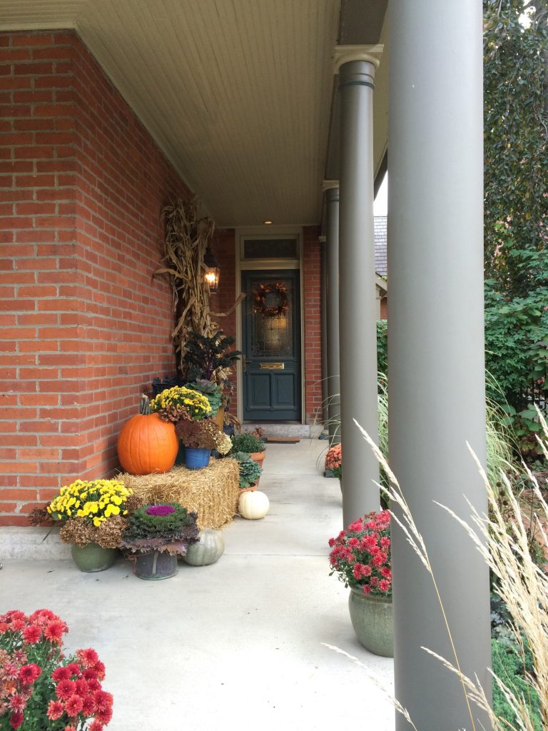 Small eclectic porch photo in Columbus with a roof extension by Gardens By Monette, LLC | Outdoor Photos | Porch | Landscaping | Landscape Design | Outdoor Living Space | Porch Design Ideas | Outdoor Living Space Ideas | Backyard Design