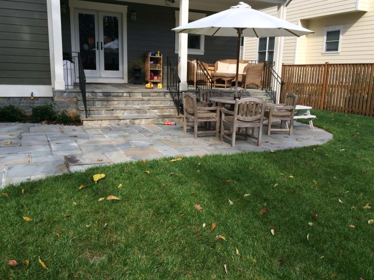 Small elegant backyard stone patio kitchen photo in DC Metro with no cover