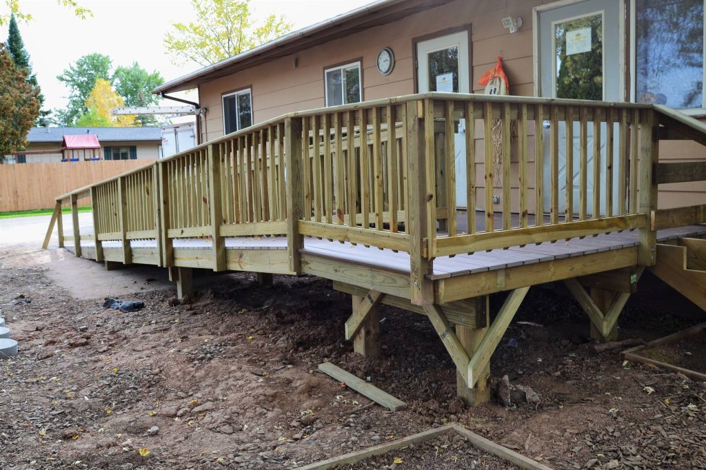 Small elegant porch photo in Other by KV Build | Outdoor Photos | Porch | Landscaping | Landscape Design | Outdoor Living Space | Porch Design Ideas | Outdoor Living Space Ideas | Backyard Design