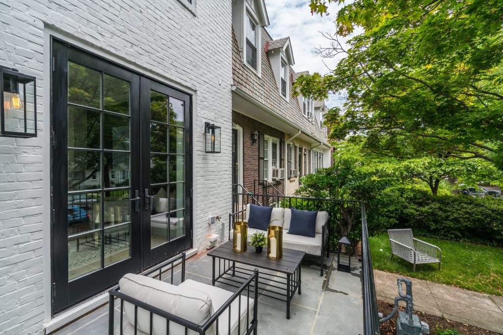 Small farmhouse stone front porch photo in DC Metro by Vici Investments | Outdoor Photos | Porch | Landscaping | Landscape Design | Outdoor Living Space | Porch Design Ideas | Outdoor Living Space Ideas | Backyard Design