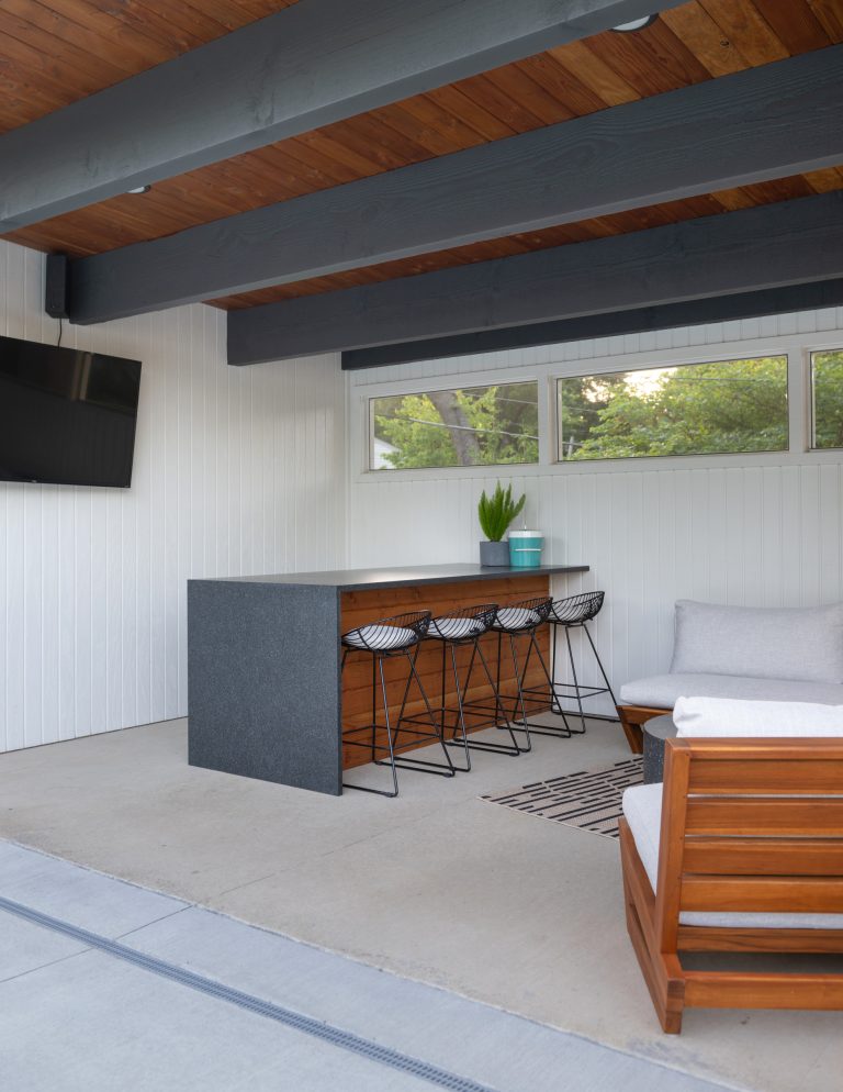 Small minimalist backyard concrete and rectangular pool house photo in Kansas City